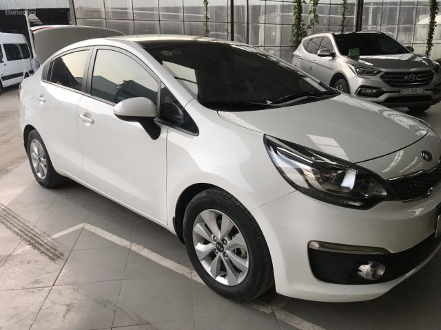 Bán Kia Rio sedan 1.4MT màu trắng, số sàn, nhập Hàn Quốc 2015, biển tỉnh, chạy 69000km