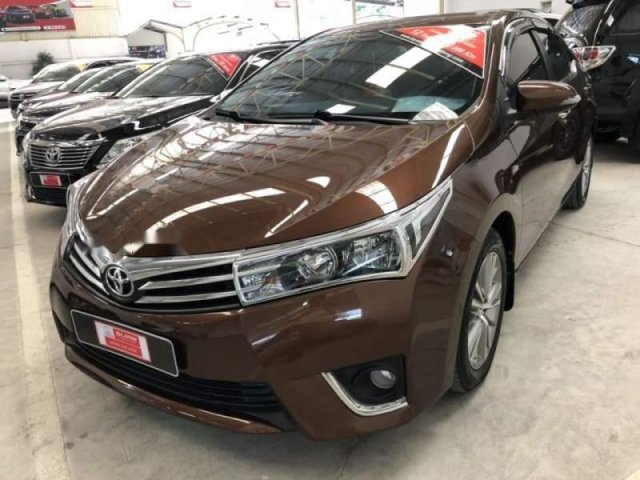 Bán gấp Toyota Corolla altis 1.8G MT sản xuất 2014, màu nâu số sàn, giá chỉ 620 triệu