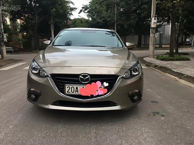 Bán Mazda 3 1.5 AT năm sản xuất 2016, màu vàng  