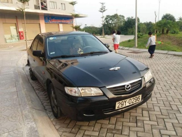 Bán Mazda 626 đời 2000, màu đen, xe nhập số sàn 