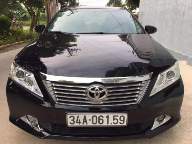 Cần bán Toyota Camry đời 2013, màu đen, 755 triệu