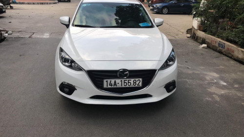 Bán Mazda 3 1.5 AT đời 2015, màu trắng chính chủ