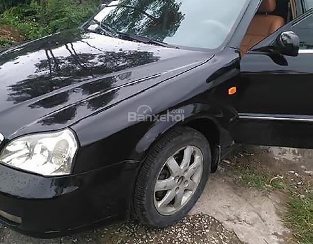 Cần bán lại xe Daewoo Magnus 2002, màu đen