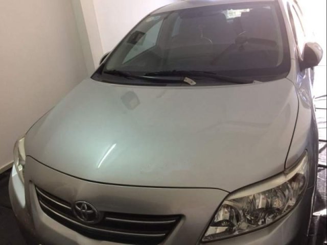 Cần bán lại xe Toyota Corolla altis 1.8G 2009, màu bạc 