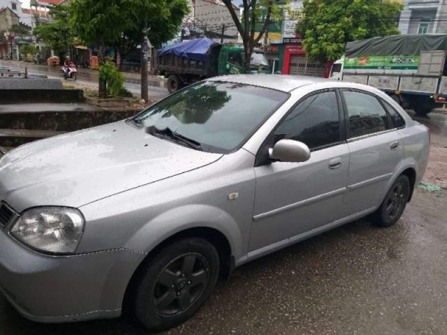 Cần bán xe Daewoo Lacetti MT năm sản xuất 2005, màu bạc 0