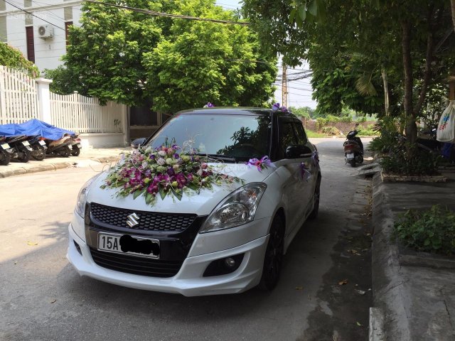 Bán xe Suzuki Swift 1.4 AT 2014, hai màu chính chủ, giá tốt