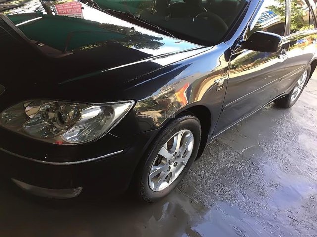 Cần bán lại xe Toyota Camry 2.4G đời 2005, màu đen xe gia đình, 400tr