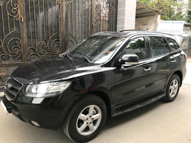 Bán gấp xe Hyundai Santafe số sàn 2009, máy xăng, màu đen