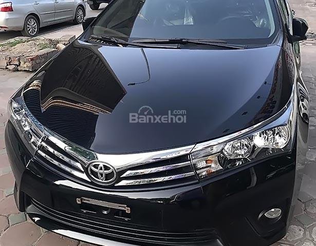 Cần bán xe Toyota Corolla altis 1.8G AT năm sản xuất 2015, màu đen 