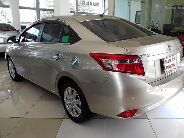 Bán Toyota Vios 1.5E năm sản xuất 2016, màu vàng như mới, giá tốt