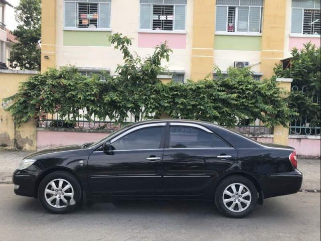 Cần bán gấp Toyota Camry 3.0V năm sản xuất 2003, màu đen chính chủ, giá chỉ 335 triệu