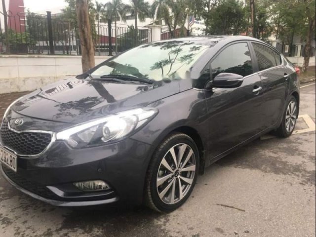 Cần bán lại xe Kia K3 2015, màu đen còn mới, giá 520tr