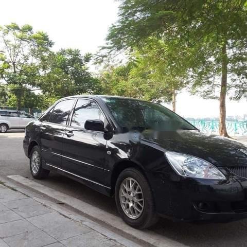 Cần bán xe Mitsubishi Lancer đời 2004, màu đen