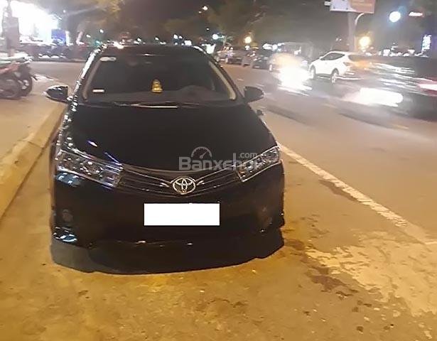 Bán gấp Toyota Corolla altis 1.8G MT đời 2014, màu đen