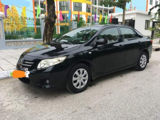 Tôi cần bán xe ô tô Toyota Corolla XLi 1.6 model 2009, sản xuất năm 2008 màu đen