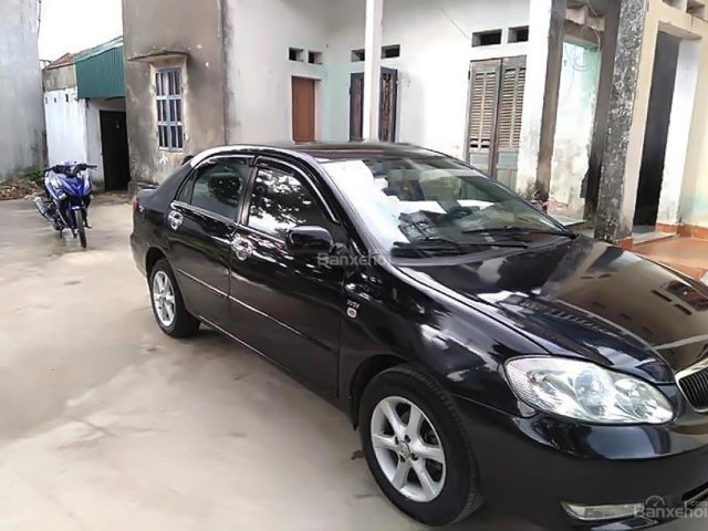 Cần bán lại xe Toyota Corolla altis MT năm 2003, màu đen số sàn, giá 245tr