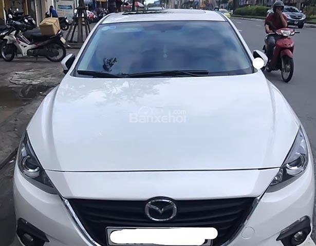 Bán xe Mazda 3 1.5 AT sản xuất 2015, màu trắng, 560tr0