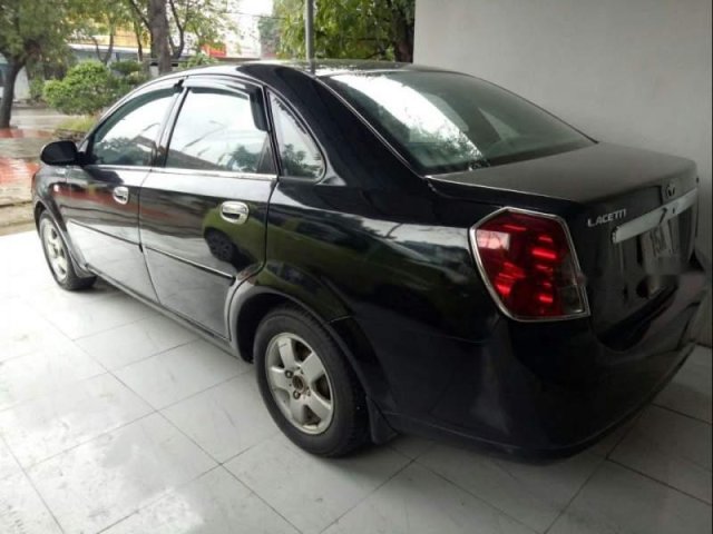 Cần bán lại xe Daewoo Lacetti sản xuất năm 2004, màu đen chính chủ