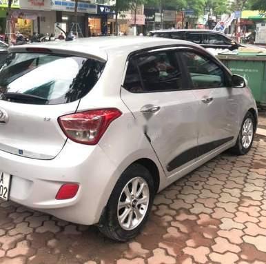 Cần bán xe Hyundai Grand i10 AT 1.2 sản xuất năm 2015, màu bạc còn mới