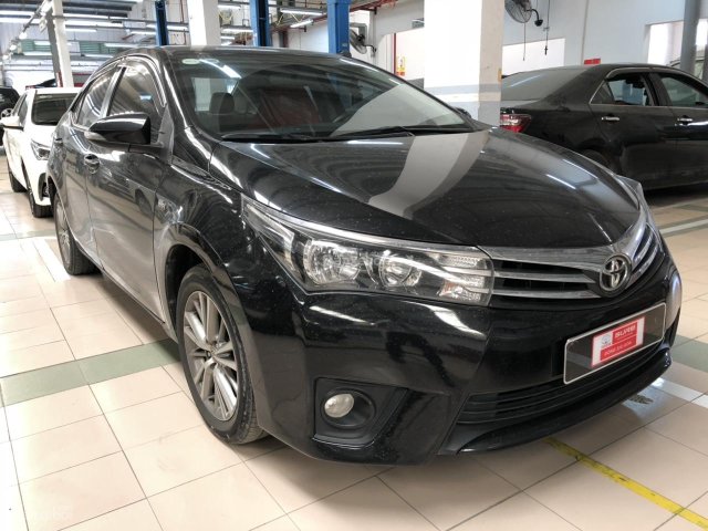 Bán xe Toyota Corolla Altis 1.8G đời 2015 màu đen giá thương lượng với khách hàng xem mua xe