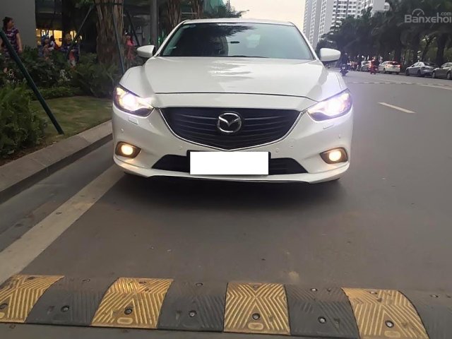 Bán Mazda 3 2.5AT 2015, màu trắng như mới