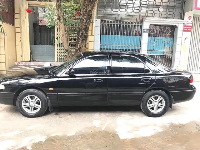 Cần bán xe Mazda 626 1997, màu đen, nhập khẩu nguyên chiếc 