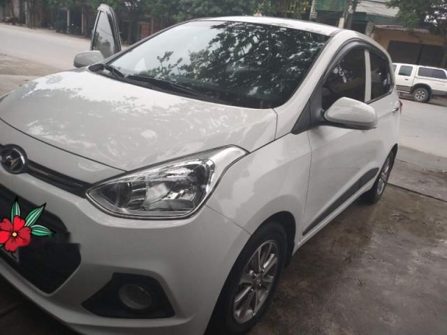 Cần bán Hyundai Grand i10 AT đời 2015, màu trắng, nhập khẩu nguyên chiếc