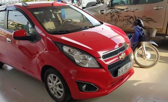 Cần bán lại xe Chevrolet Spark LTZ năm sản xuất 2014, màu đỏ xe gia đình