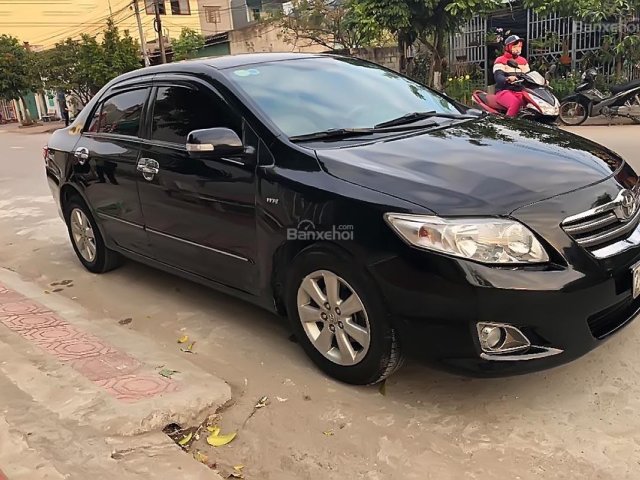 Cần bán lại xe Toyota Corolla altis 1.8G MT đời 2009, màu đen số sàn