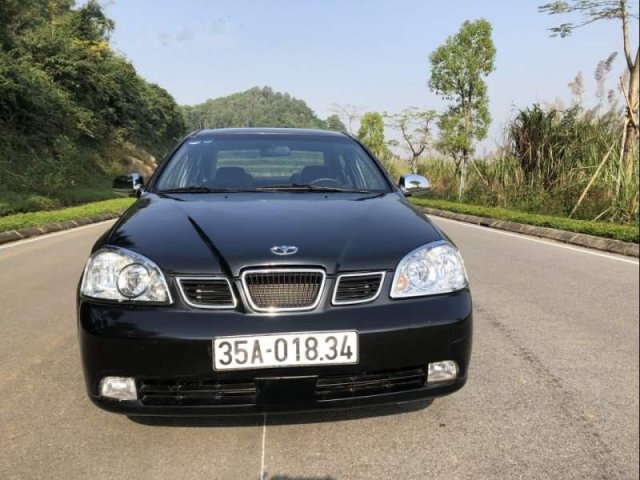 Bán xe Daewoo Lacetti năm 2004, màu đen xe gia đình, giá 129tr