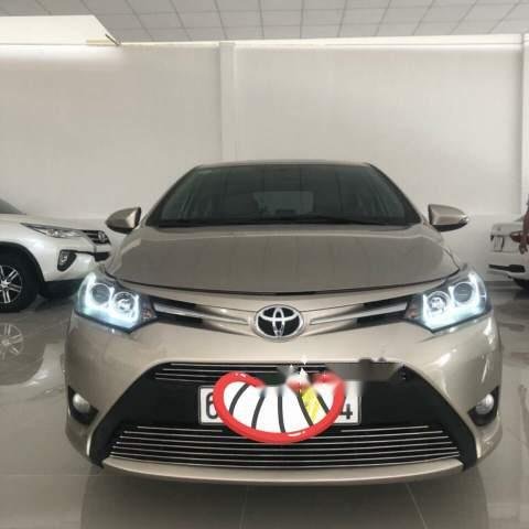 Cần bán xe Toyota Vios đời 2014, màu vàng0