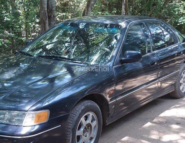 Cần bán Honda Accord 2.0 MT sản xuất 1994, màu xanh lam, xe hơi xước nhẹ