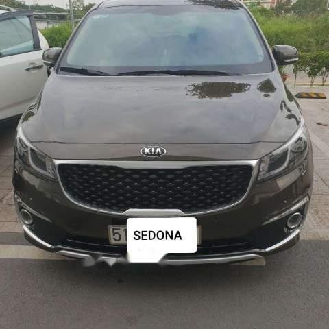 Cần bán Kia Sedona đời 2016, màu nâu, xe gia đình, 980 triệu