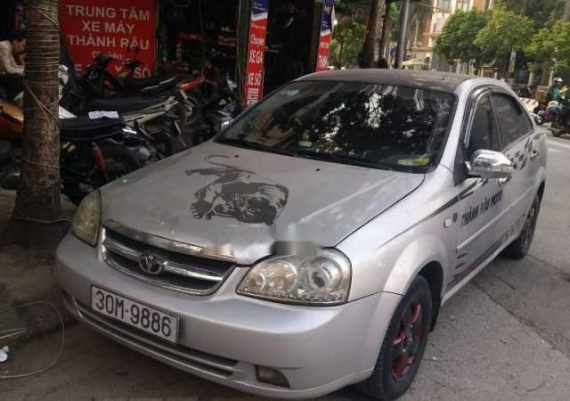 Gia đình bán Daewoo Lacetti EX đời 2009, màu bạc, nhập khẩu