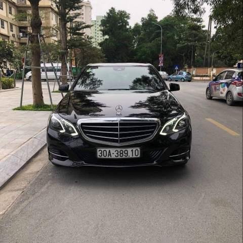 Bán xe Mercedes E200 2014, màu đen còn mới