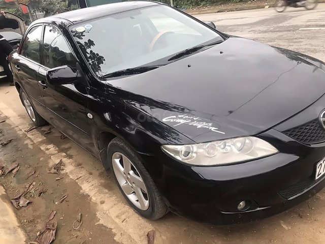 Bán Mazda 6 đời 2004, màu đen số sàn