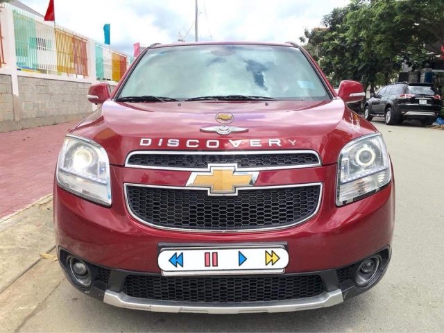 Cần bán gấp Chevrolet Orlando 2015 màu đỏ mận