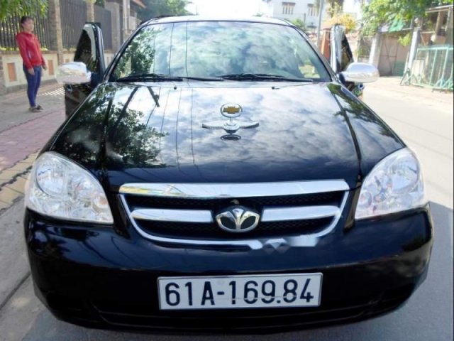 Tôi cần bán xe Daewoo Lacetti dòng cao cấp EX 1.6 rất kinh tế, số sàn, màu đen