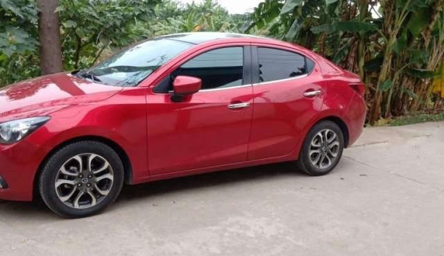 Bán xe Mazda 2 sản xuất 2016, màu đỏ, xe nhập