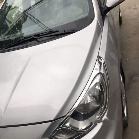 Gia đình bán ô tô Hyundai Accent đời 2011, màu bạc, nhập khẩu, 295tr