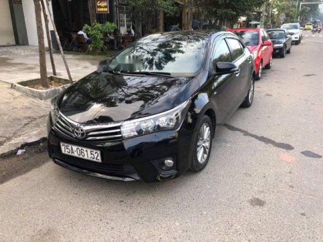 Chính chủ bán Toyota Corolla altis 2015, màu đen, xe nhập