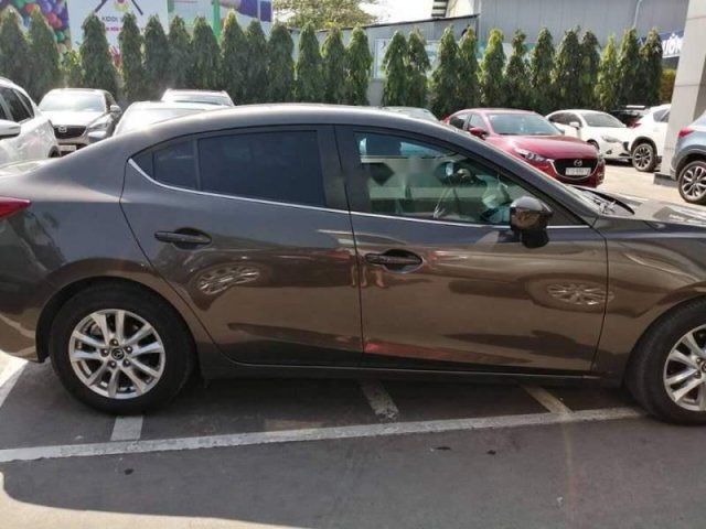 Cần bán Mazda 3 1.5AT sản xuất 2015, màu nâu, giá chỉ 580 triệu