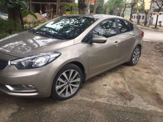 Cần bán Kia K3 năm sản xuất 2015, màu vàng, giá 450tr