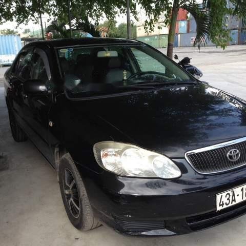 Cần bán gấp Toyota Corolla altis sản xuất năm 2003, màu đen, xe nhập, giá chỉ 250 triệu