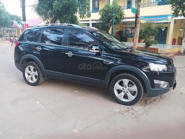 Cần bán Chevrolet Captiva LT 2.4 MT sản xuất 2012, màu đen đã đi 58000km