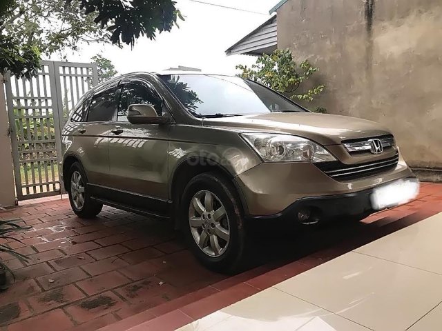 Cần bán xe Honda CR V đời 2009, màu vàng, nhập khẩu nguyên chiếc số tự động