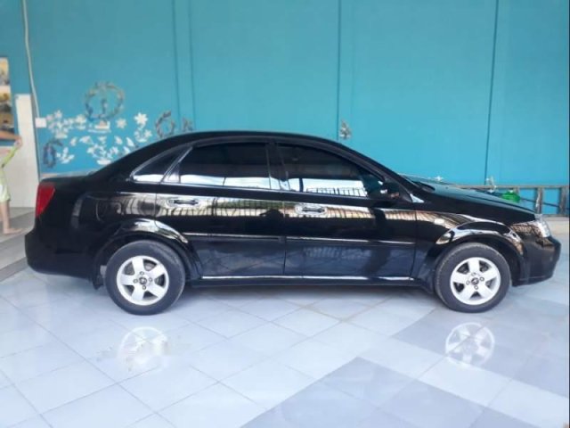 Cần bán lại xe Daewoo Lacetti năm sản xuất 2010, màu đen, nhập khẩu nguyên chiếc, xe gia đình