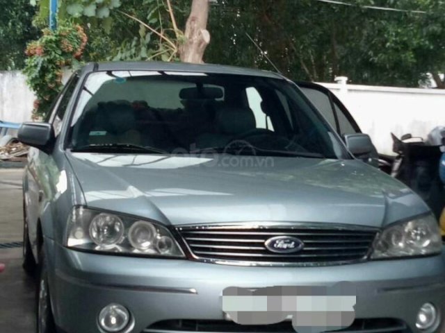 Cần bán gấp Ford Laser LXi 1.6 MT năm 2004, màu xám xe gia đình giá cạnh tranh