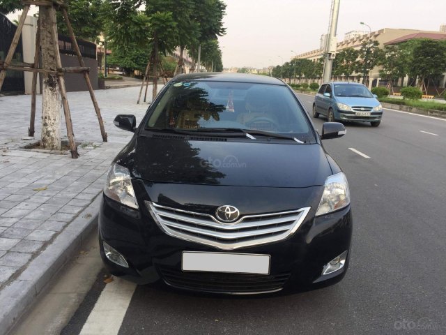 Cần bán gấp chiếc Toyota Vios 1.5E 2011 số sàn, màu đen, chính chủ gia đình tôi