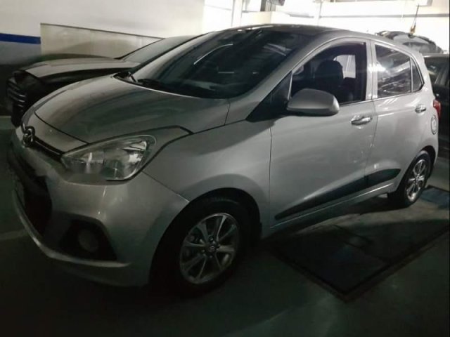 Bán Hyundai Grand i10 1.0AT đời 2015, màu bạc, nhập khẩu  